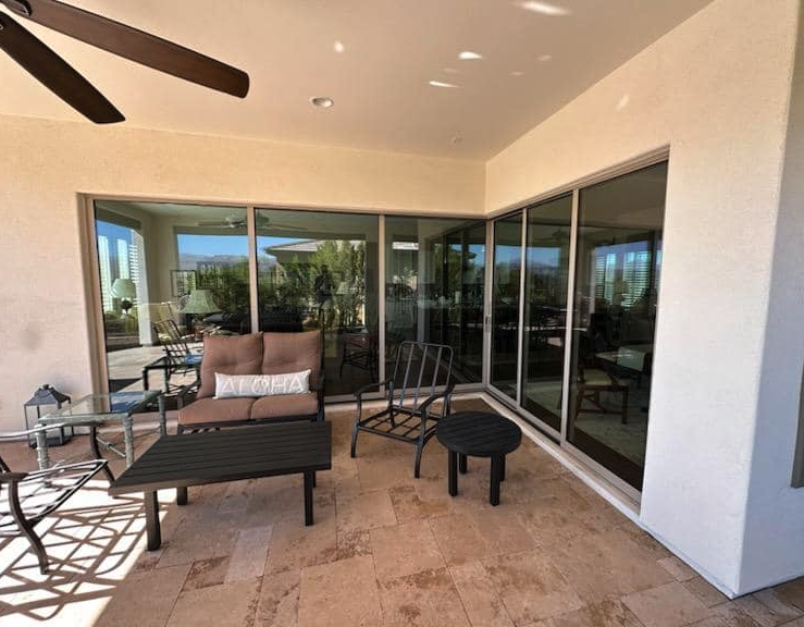Sliding glass patio door screens cleaned on a covered lanai