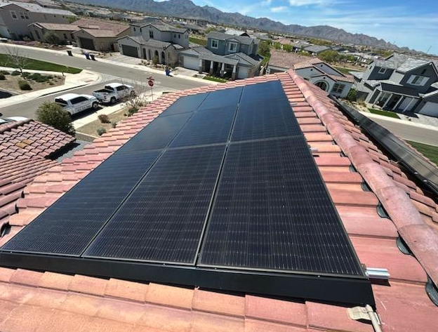 Sun screens cleaned on a Phoenix neighborhood rooftop-level window