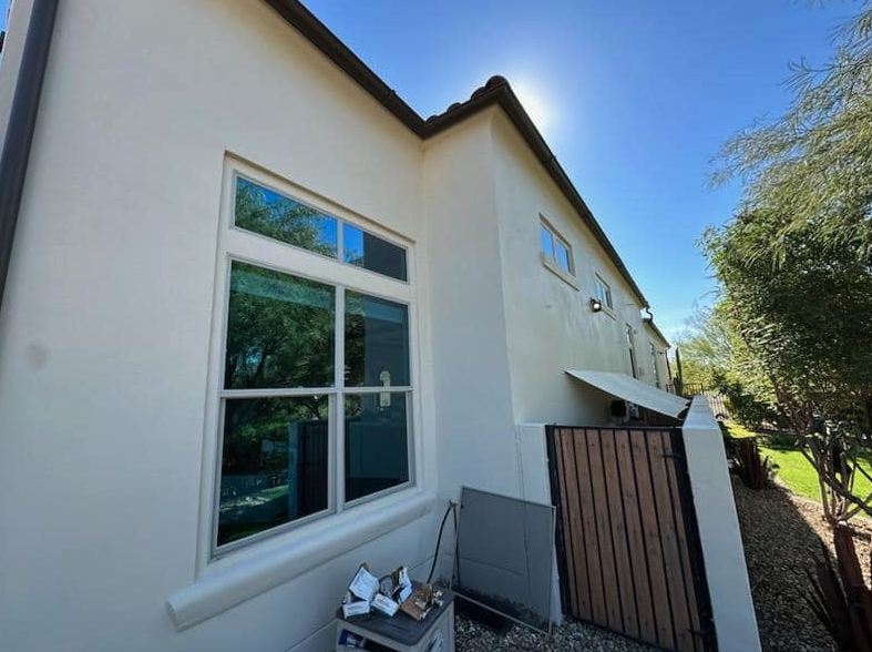 Double-hung window screens cleaned on a two-story Phoenix home